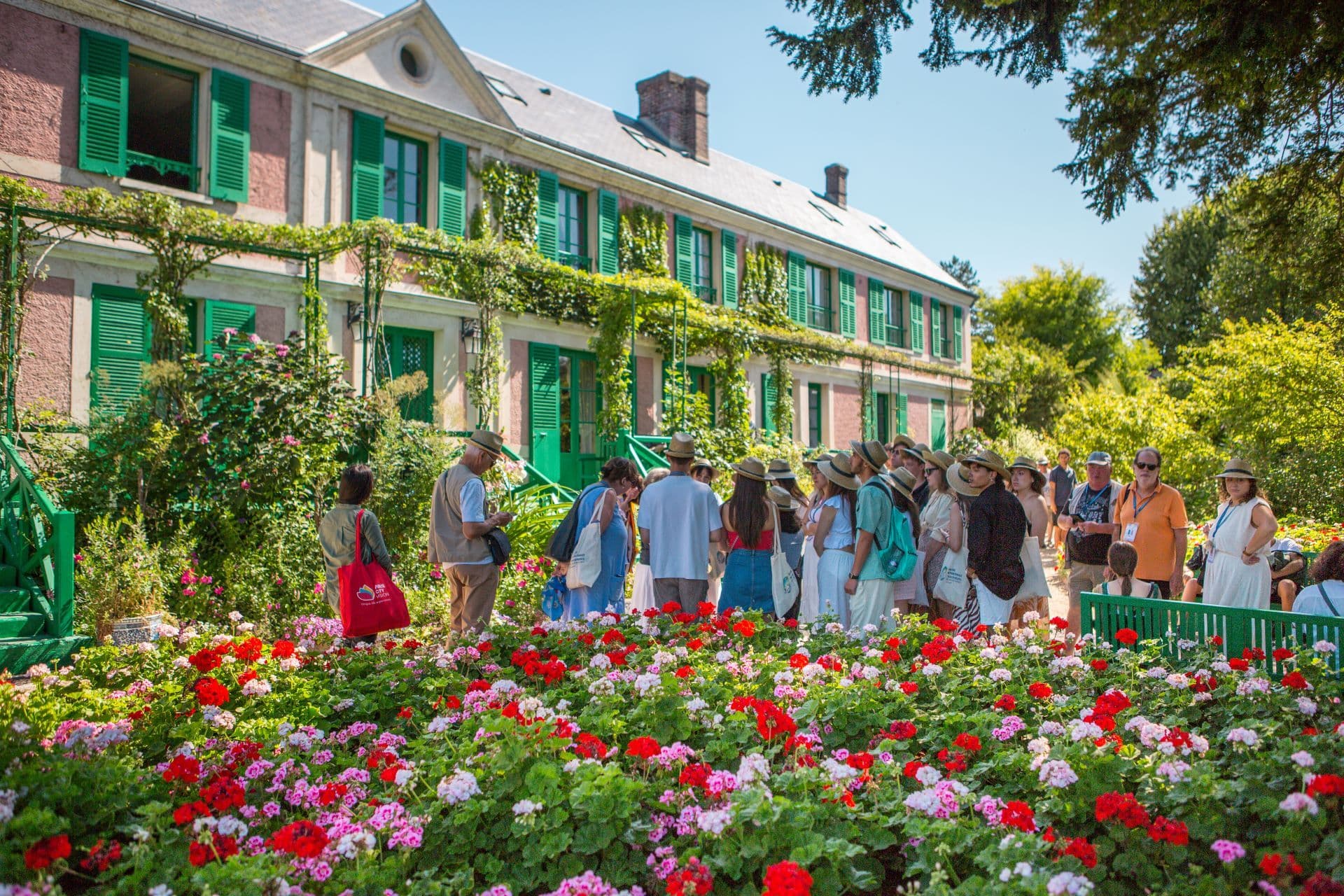 Monet's pink house and the Clos Normand flower garden in Giverny